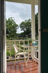 Ein Balkon oder eine Terrasse in der Unterkunft Ban Ing Suan