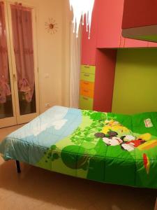 Posteľ alebo postele v izbe v ubytovaní PIANO TERRA CON GIARDINO VICINO AL MARE + 18 fotografií
