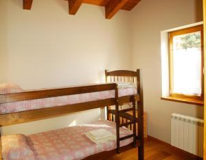 A bed or beds in a room at Casa para familias en Prullans