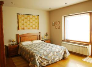 A bed or beds in a room at Casa para familias en Prullans