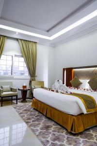 Postel nebo postele na pokoji v ubytování Meral Oasis Resort Taif