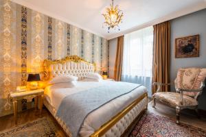 Postel nebo postele na pokoji v ubytování Boutique Hotel Die Swaene