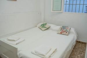 Posteľ alebo postele v izbe v ubytovaní Casa Juan Breva