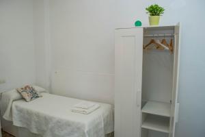 Posteľ alebo postele v izbe v ubytovaní Casa Juan Breva