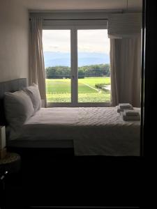Ein Bett oder Betten in einem Zimmer der Unterkunft Auberge de Duillier