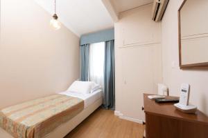 Postel nebo postele na pokoji v ubytování Hotel La Pace