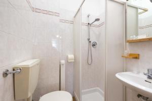 Koupelna v ubytování Hotel La Pace