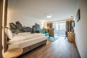 Postel nebo postele na pokoji v ubytování Vitaurina Royal Hotel + 37 fotografií
