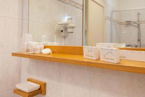 Koupelna v ubytování Hotel La Pace