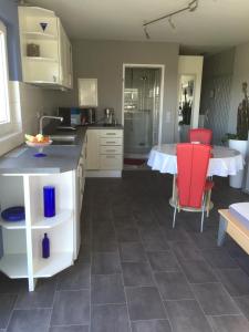 Kuchyň nebo kuchyňský kout v ubytování VIP Appartement