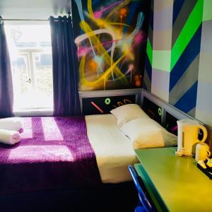 Postel nebo postele na pokoji v ubytování KX Rooms Kings Cross
