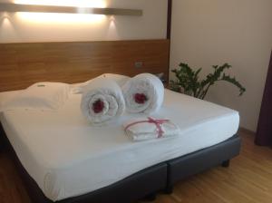 Postel nebo postele na pokoji v ubytování Al Marinaio Hotel Garni