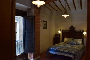 Postel nebo postele na pokoji v ubytování Casa Balcón de Albarracín