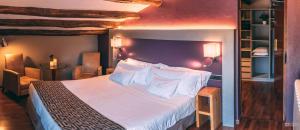 Cama o camas de una habitación en Hotel Hostal Estrella
