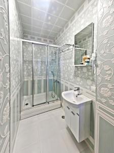 Ett badrum på Nusretbey Hotel