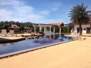 The swimming pool at or close to Mae Phim -Beachfront living in a villa with a private pool !