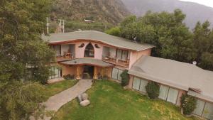 an aerial view of a house in the mountains at SEL Lodge - Aventura y Descanso in San José de Maipo