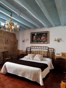 Postel nebo postele na pokoji v ubytování Hotel Rural El Perdigón