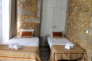 Letto o letti in una camera di Art'Otel Barcelos