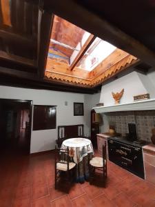 Kuchyň nebo kuchyňský kout v ubytování Hotel Rural El Perdigón