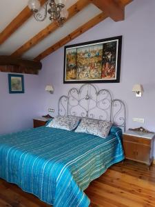 Postel nebo postele na pokoji v ubytování Hotel Rural El Perdigón