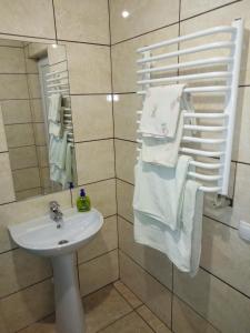 Ванная комната в Apartament on Komarova 29 вулиця Комарова 29