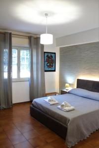 Postel nebo postele na pokoji v ubytování B&B Atlante