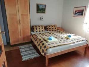 Postel nebo postele na pokoji v ubytování Apartmán Hořice na Šumavě