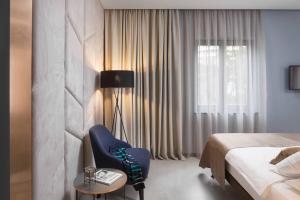 Postel nebo postele na pokoji v ubytování Terra Residence