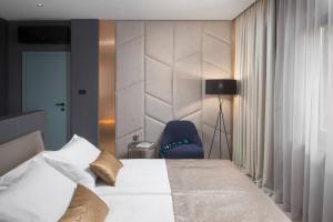 Postel nebo postele na pokoji v ubytování Terra Residence