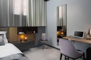 Postel nebo postele na pokoji v ubytování Terra Residence