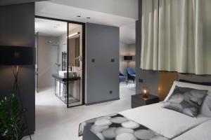 Postel nebo postele na pokoji v ubytování Terra Residence