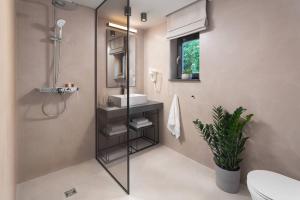 Koupelna v ubytování Terra Residence + 37 fotografií