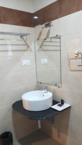 Koupelna v ubytování Hotel Saayein Residency