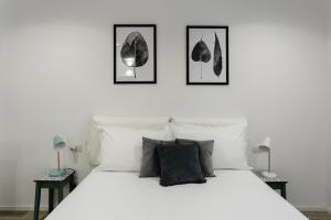 Voodi või voodid majutusasutuse Milanofierapartments toas