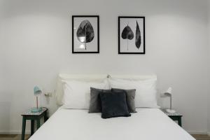 Posteľ alebo postele v izbe v ubytovaní Milanofierapartments