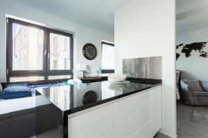 A kitchen or kitchenette at Luxury Apartment with Large Terrace