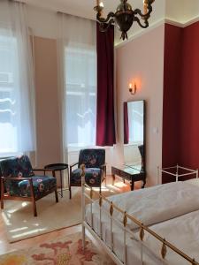 Posteľ alebo postele v izbe v ubytovaní Madana apartman