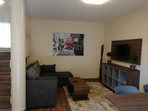 A seating area at Óvár Apartman