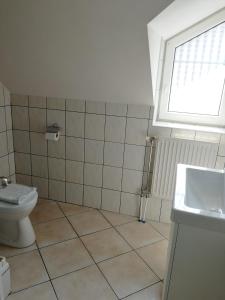 A bathroom at Óvár Apartman