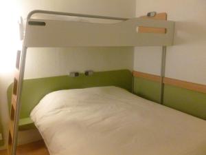 Postel nebo postele na pokoji v ubytování Ibis budget Dunkerque Grande Synthe