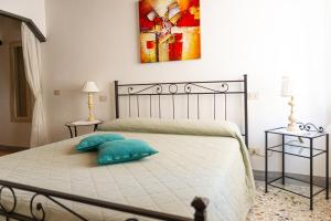 Postelja oz. postelje v sobi nastanitve Casa vacanze al Castello.