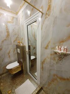 Koupelna v ubytování FD Luxury rooms