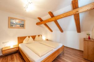 Postel nebo postele na pokoji v ubytování Gasthaus Traube