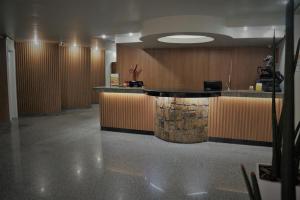 The lobby or reception area at Fenix Hotel Pouso Alegre