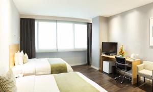 Sjónvarps- og/eða afþreyingartæki á Unipark by Oro Verde Hotels