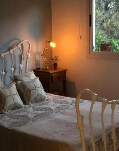 Een bed of bedden in een kamer bij LA MACARENA