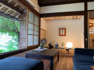 Posezení v ubytování Private GUEST HOUSE KUMANOYASAI near Takahara