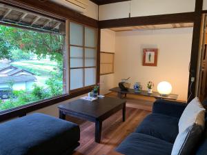Posezení v ubytování Private GUEST HOUSE KUMANOYASAI near Takahara