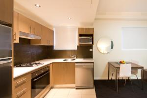 Una cocina o kitchenette en APX World Square